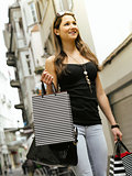 Young woman in the city shopping