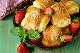 sweet muffins with strawberries and sugar - homemade pastries