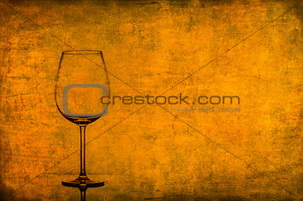 Empty wine glass on nice vintage texture