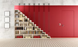 Red Living room with wooden staircase and bookcase