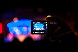 Taking video with smartphone during a public concert