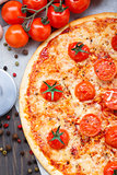 Vegetarian pizza with cherry tomatoes