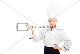 professional female cook raise hands to show something 