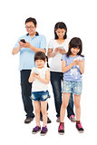 Happy Family standing and using smart phone together