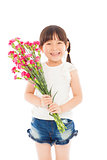 smiling little girl holding a bouquet carnation