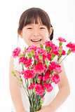 close up of happy little girl holding  a bouquet of carnations