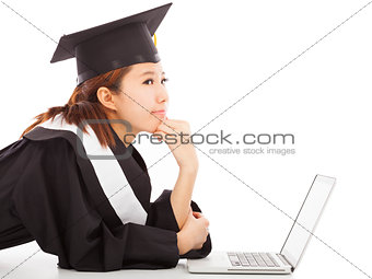 female graduation thinking about career or job