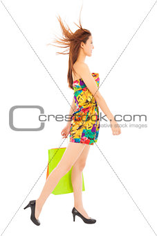 happy young  woman with shopping bags