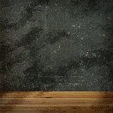 Wooden floor and concrete wall