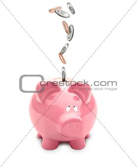 Piggy Bank with Coins Falling into Slot
