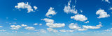 Blue sky panorama with white clouds 