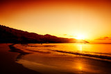 Gold sunset on the sand beach