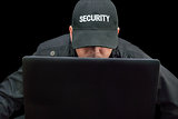 Security Working On Laptop, Brim Down