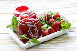 homemade jam from fresh ripe strawberries in a glass jar
