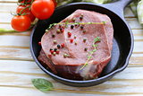 piece of raw meat beef steak with spices herbs
