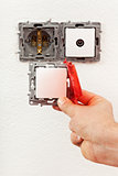 Changing a defective electrical wall fixture