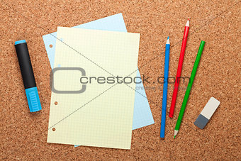 Blank notepad page on cork notice board