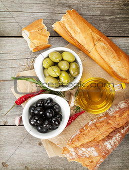 Italian food appetizer of olives, bread and spices