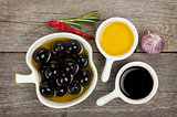 Olives, olive oil and vinegar with spices