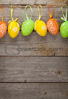 Easter eggs on wooden table background