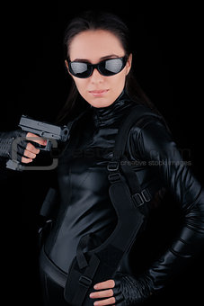Woman Spy Holding Gun