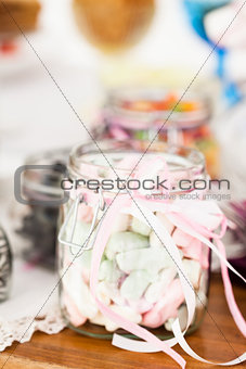 Pastel colored marshmallows in jar