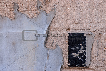 plastered wall with a ceramic tile