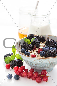 Healthy breakfast with granola and fresh berries