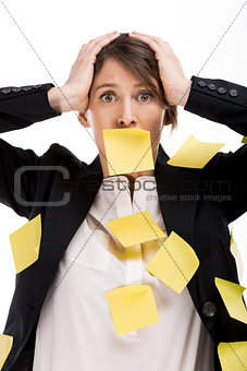 Woman with yellow paper notes