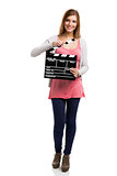 Holding  a clapboard