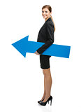 Business woman holding a blue arrow