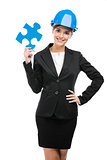 Female engineer with a puzzle piece
