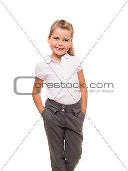 cheerful little girl wearing white t-shirt and pants isolated on
