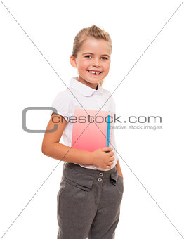 joyful little girl standing on white with notebook and pencil