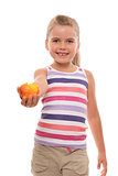 little girl offers a nectarine