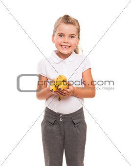 little girl standing against white backdrop with three fresh ban