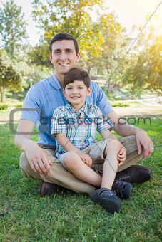 Handsome Mixed Race Father and Son Park Portrait