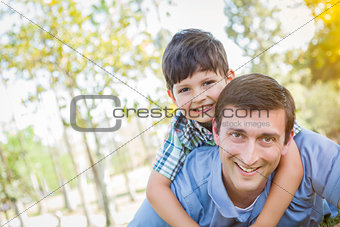 Father and Son Playing Together in the Park
