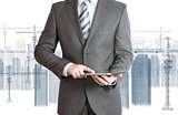 Businessman in suit hold tablet pc