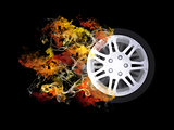 Car wheel in the colored smoke