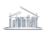 Tower crane and skyscrapers on the tablet pc