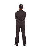 full length of businessman standing and cross arms