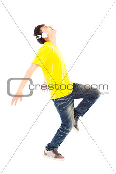 happy man dancing while listening music 