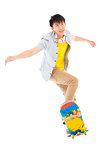 young man Skateboard to jump isolated on white background