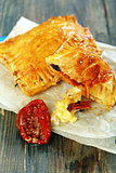 Puff pastry with cheese and sun-dried tomato.