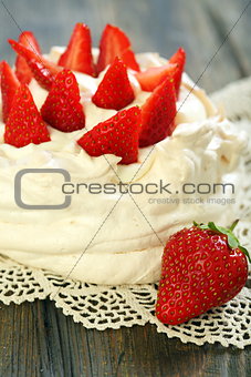 Dessert with whipped cream and strawberries.