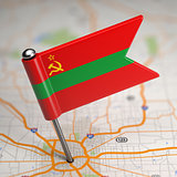 Transnistria Small Flag on a Map Background.
