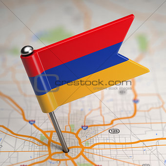 Armenia Small Flag on a Map Background.