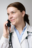 Doctor with telephone