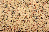 Wild rice, brown basmati and red camargue background